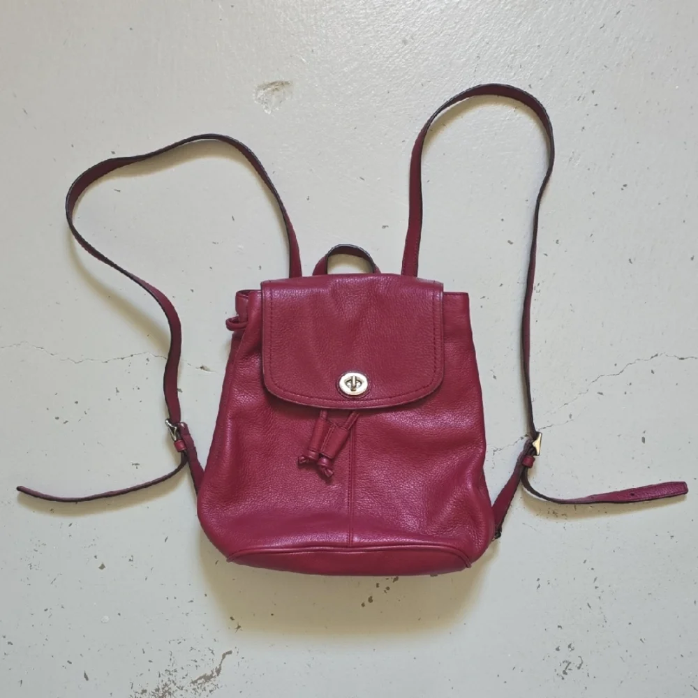 Coach Red Pebbled Leather Silver Turnlock Drawstring Backpack